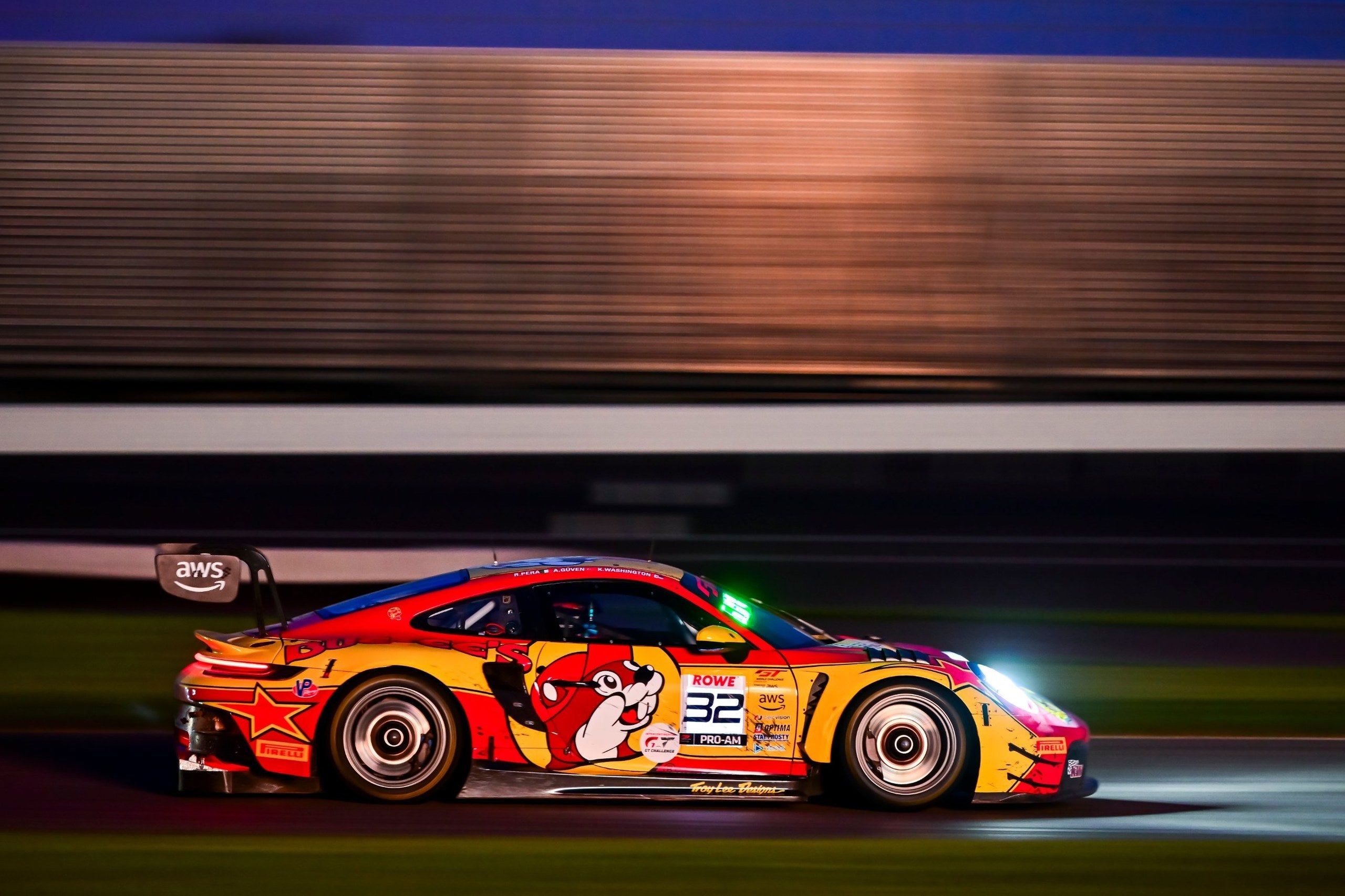 The No. 32 GMG Racing Porsche 911 GT3 R Evo at night in the Indianapolis 8 Hour